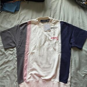 Essentials Cream and Black Tee with Red Accents